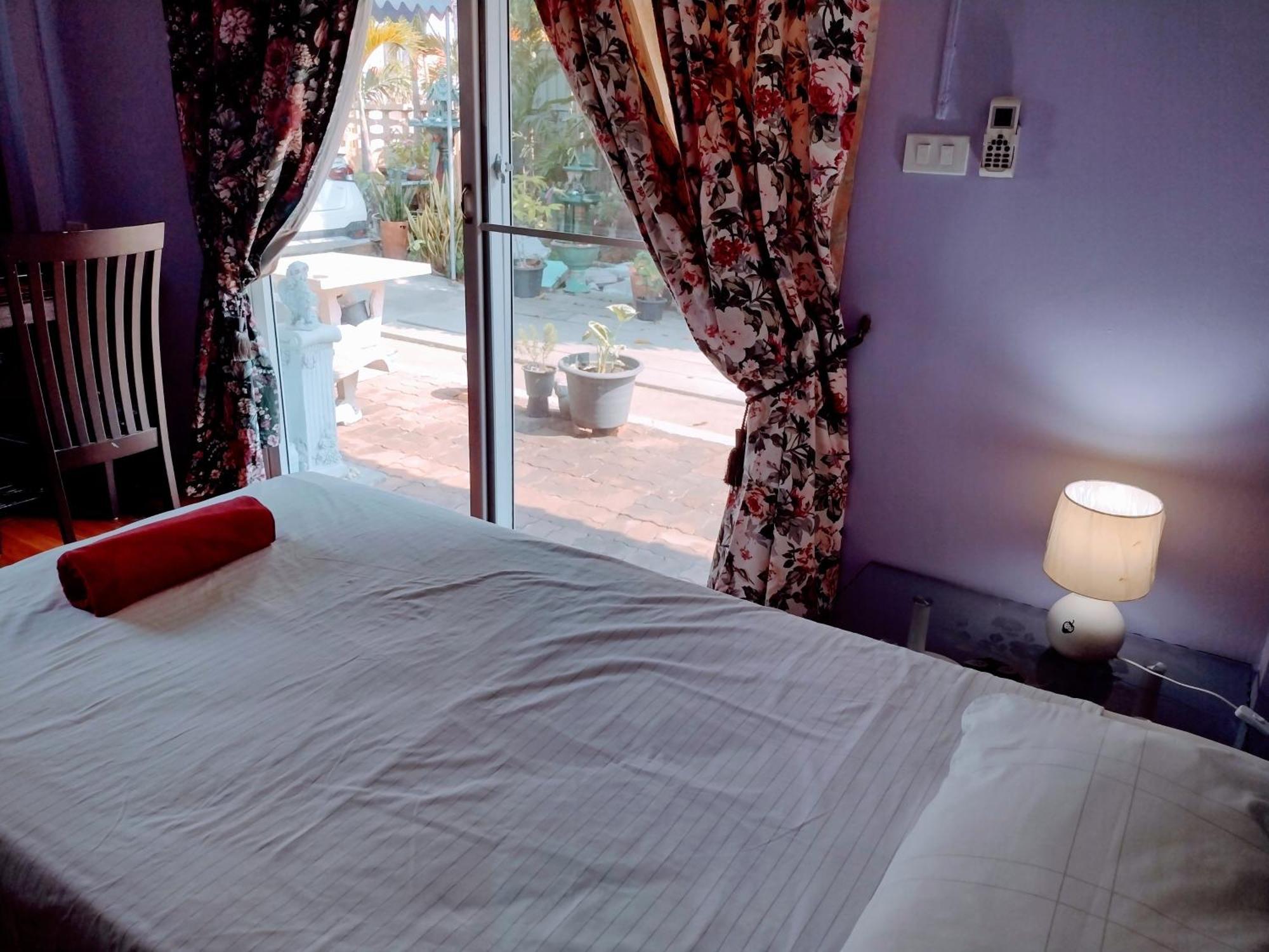 Hospedagem domiciliar Mango Tree Guestroom *